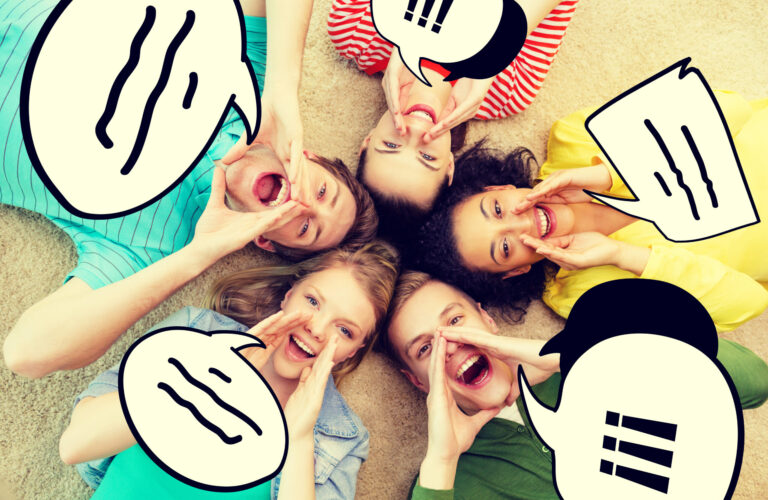 friendship, lifestyle and happiness concept - group of young smiling people lying on floor in circle screaming and shouting